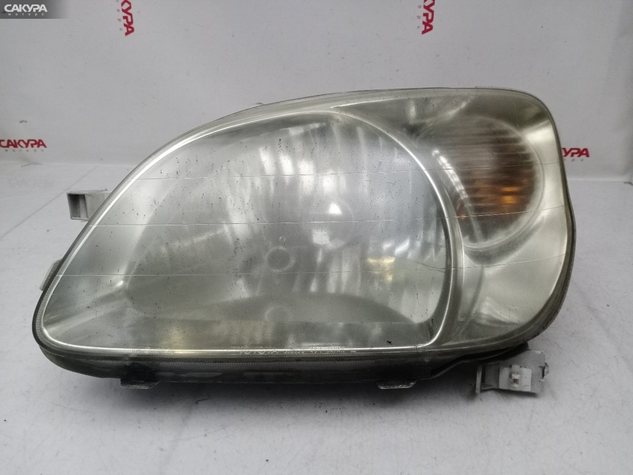 Фара левая Toyota Raum EXZ10 5E-FE 46-1: купить в Сакура Красноярск.