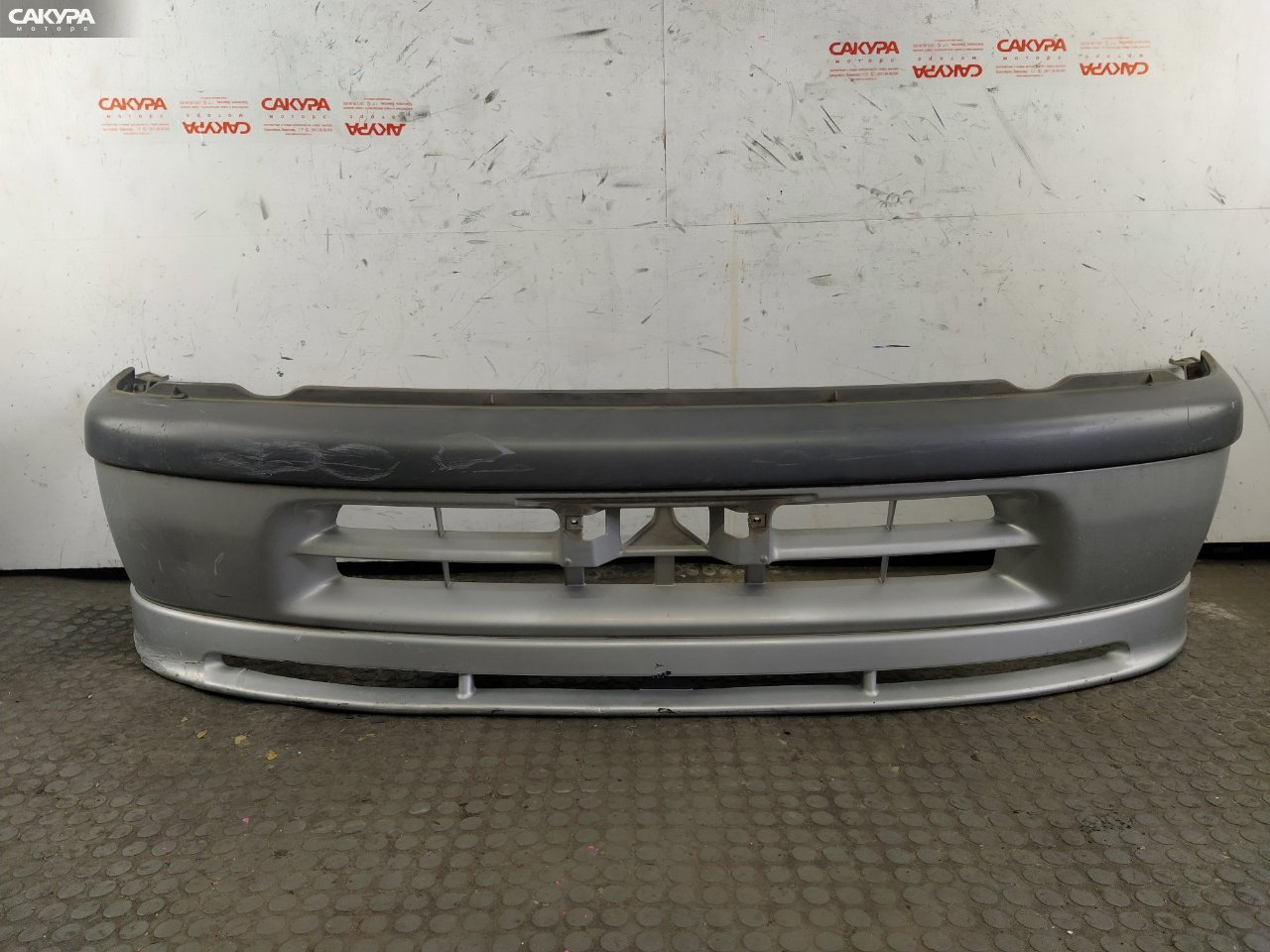 Бампер передний Toyota Raum EXZ10 5E-FE: купить в Сакура Красноярск.