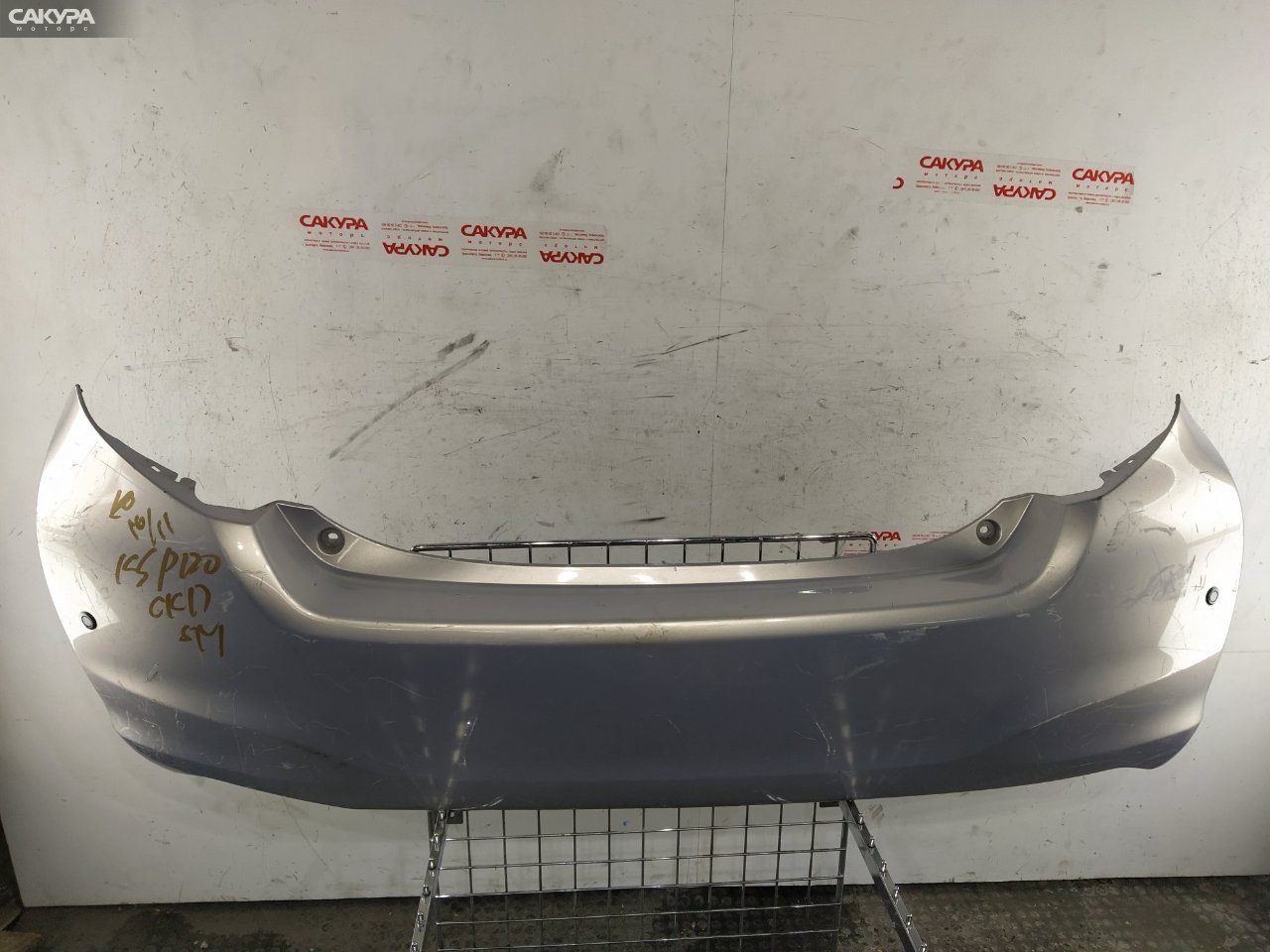 Бампер задний Toyota Vitz KSP130 1KR-FE: купить в Сакура Красноярск.
