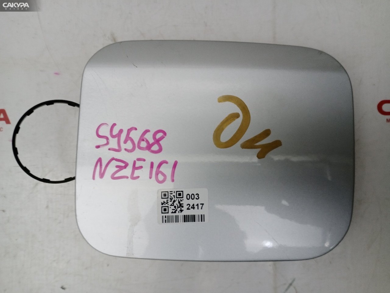 Лючок топливного бака Toyota Corolla Axio NZE161 1NZ-FE: купить в Сакура Красноярск.