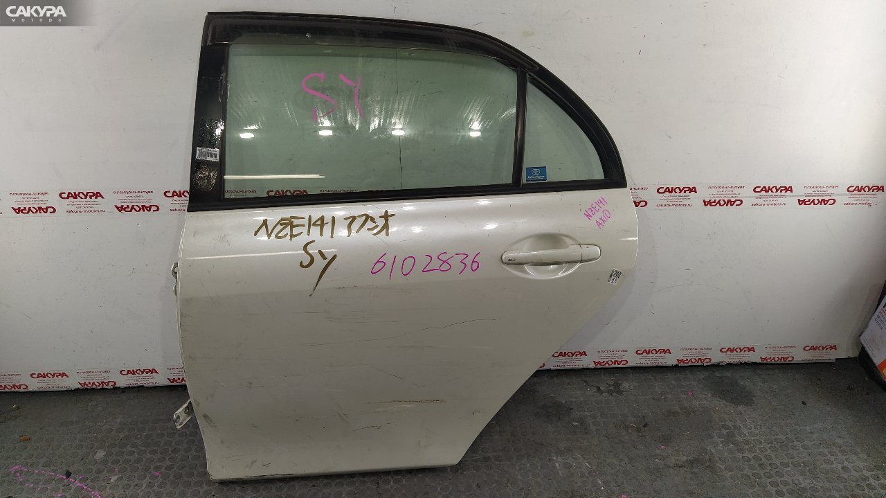 Дверь боковая задняя левая Toyota Corolla Axio NZE141 1NZ-FE: купить в Сакура Красноярск.