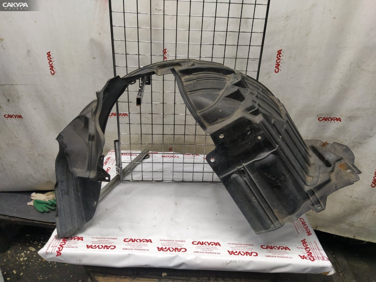 Подкрылок передний левый Nissan March AK12 CR12DE: купить в Сакура Красноярск.