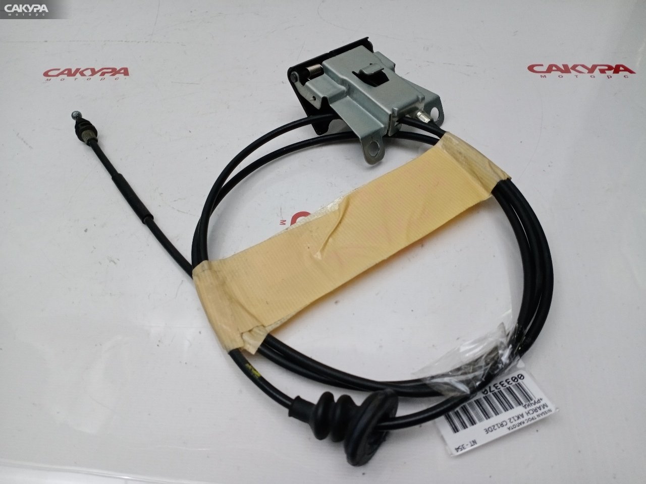 Трос капота Nissan March AK12 CR12DE: купить в Сакура Красноярск.