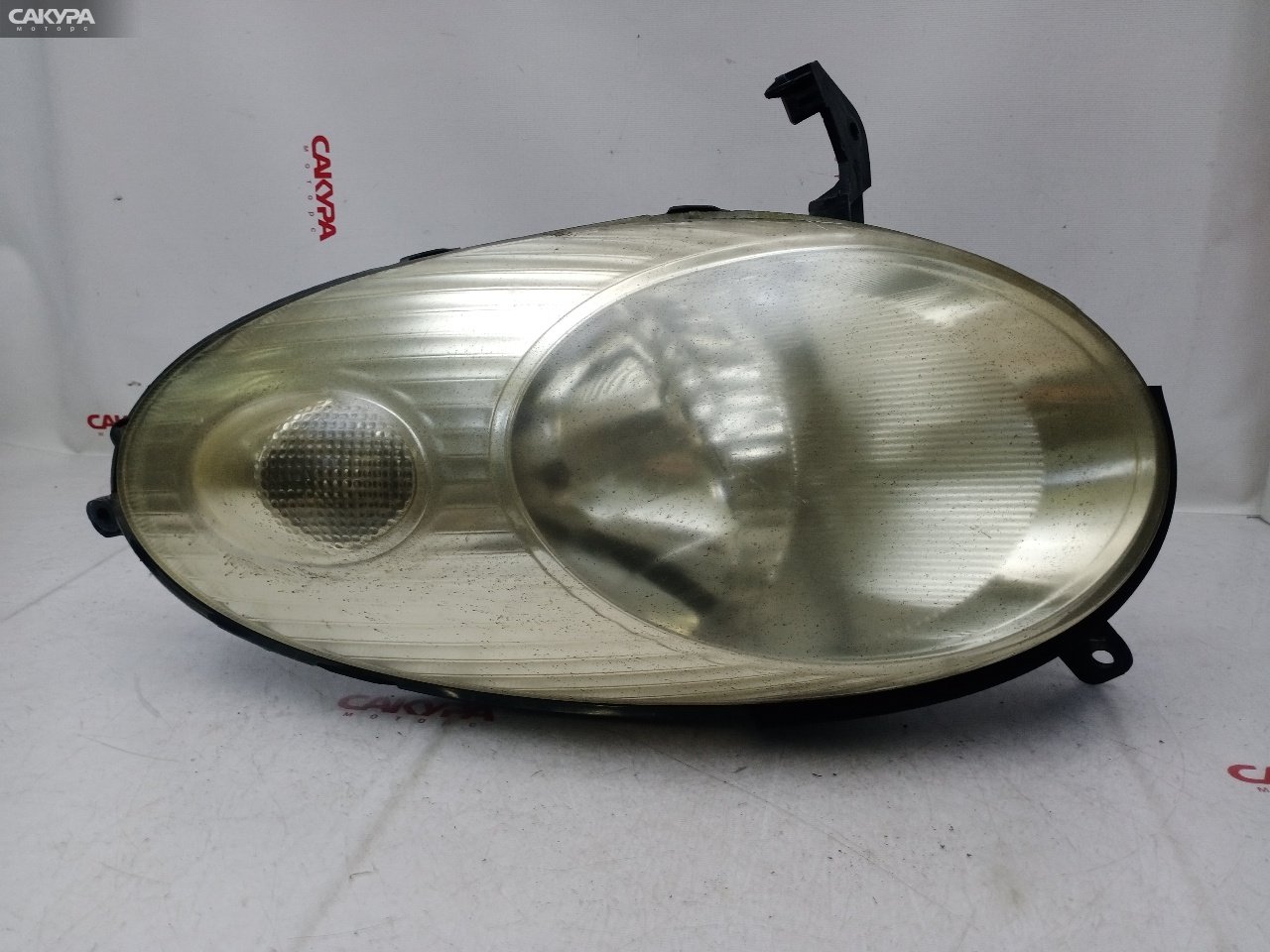 Фара левая Nissan March AK12 CR12DE 1704: купить в Сакура Красноярск.