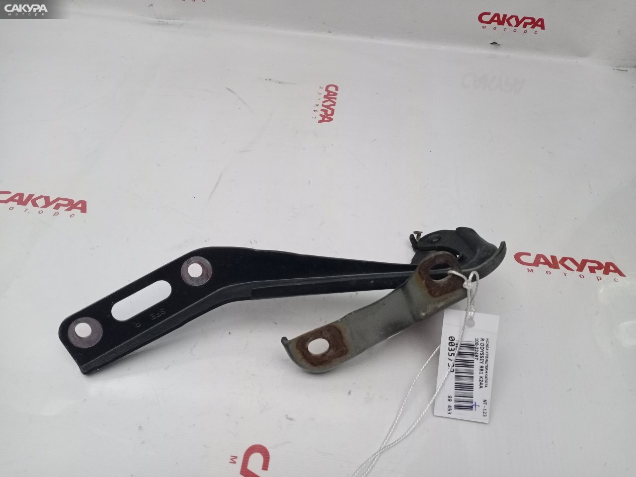Кронштейн капота правый Honda Odyssey RB1 K24A: купить в Сакура Красноярск.