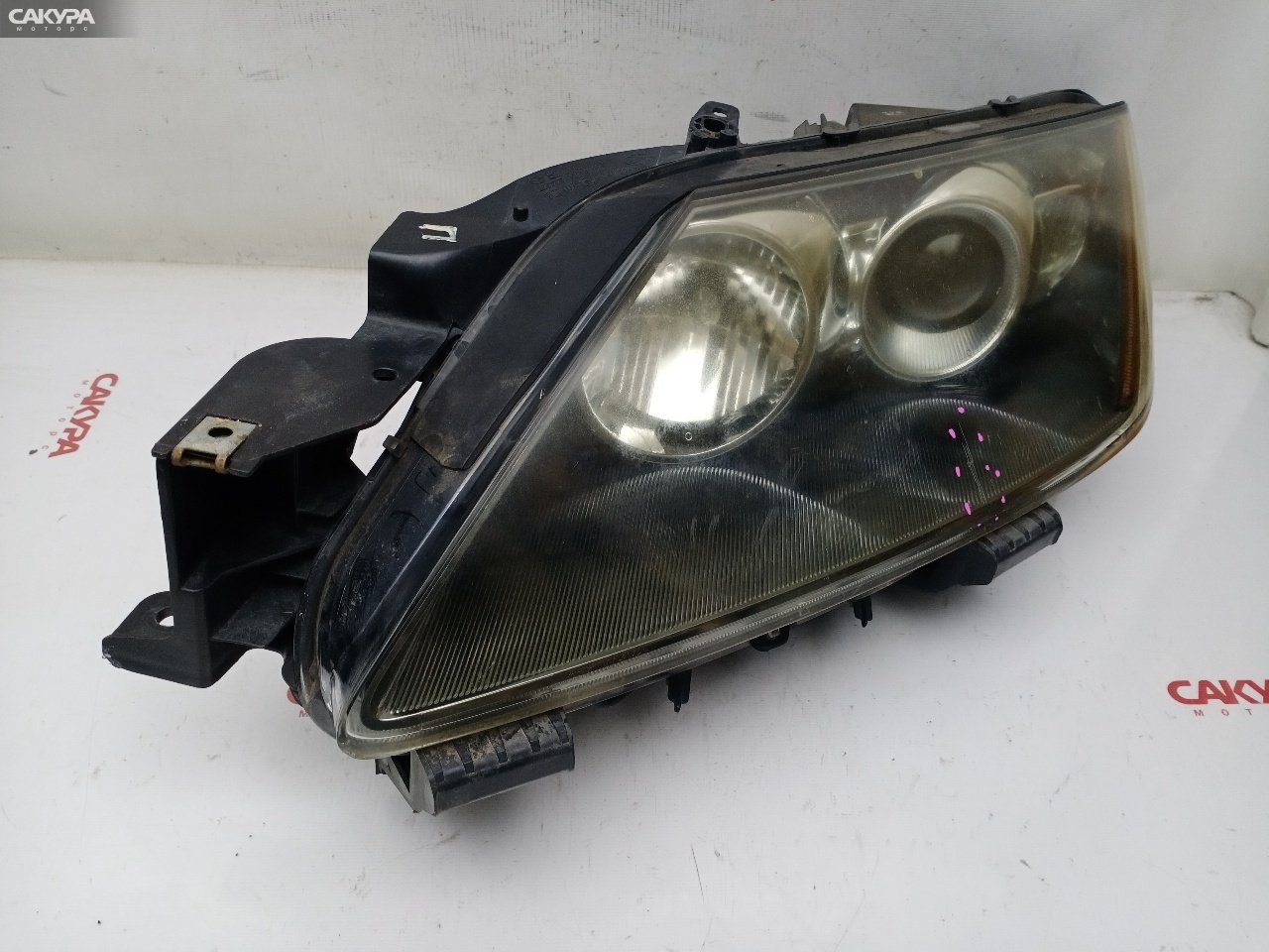 Фара левая Mazda CX-7 ER3P L3-VDT 100-61583: купить в Сакура Красноярск.