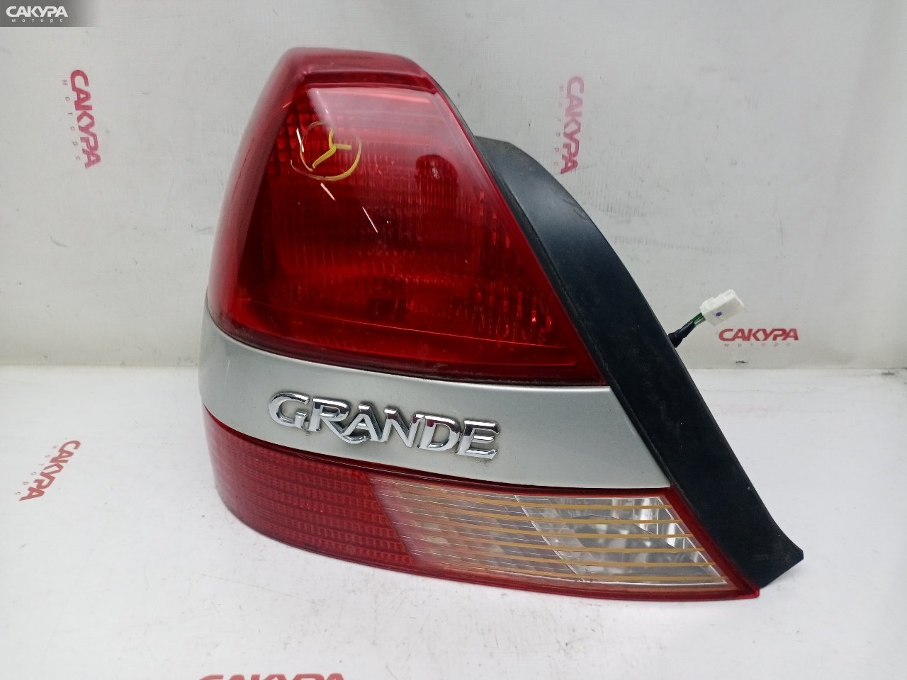 Фонарь стоп-сигнала левый Toyota Mark II JZX110 1JZ-FSE 22-305: купить в Сакура Красноярск.