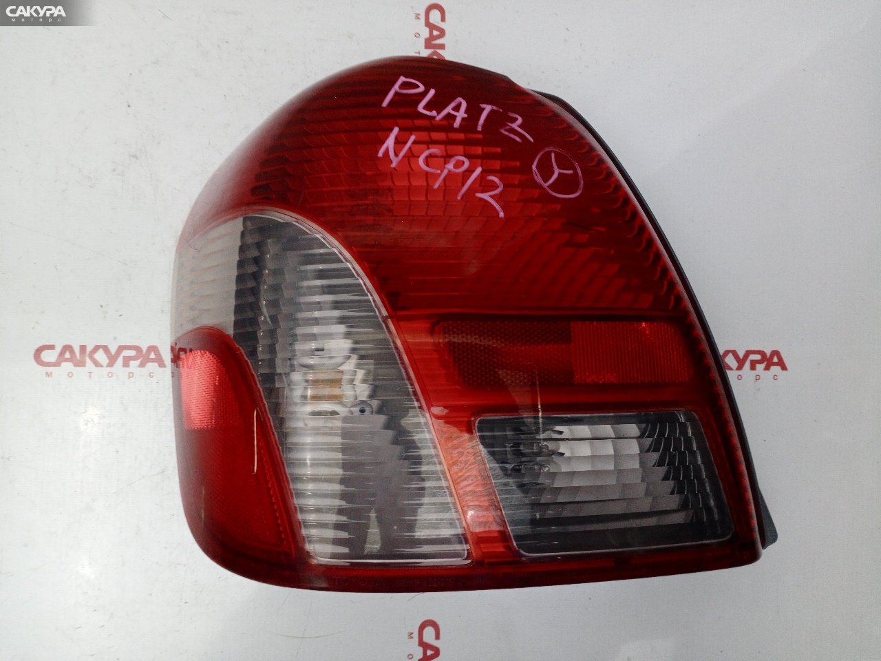 Фонарь стоп-сигнала левый Toyota Platz NCP12 1NZ-FE 52-013: купить в Сакура Красноярск.
