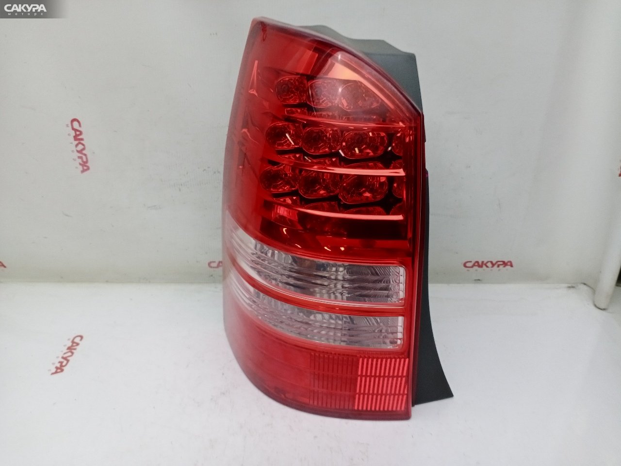 Фонарь стоп-сигнала левый Toyota Wish ZNE10G 1ZZ-FE 68-3: купить в Сакура Красноярск.