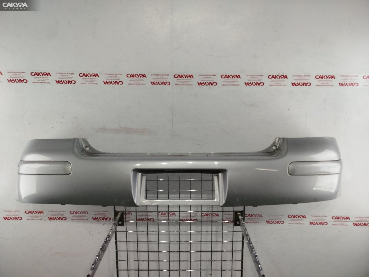 Бампер задний Toyota Vitz NCP15 2NZ-FE A3A2: купить в Сакура Красноярск.