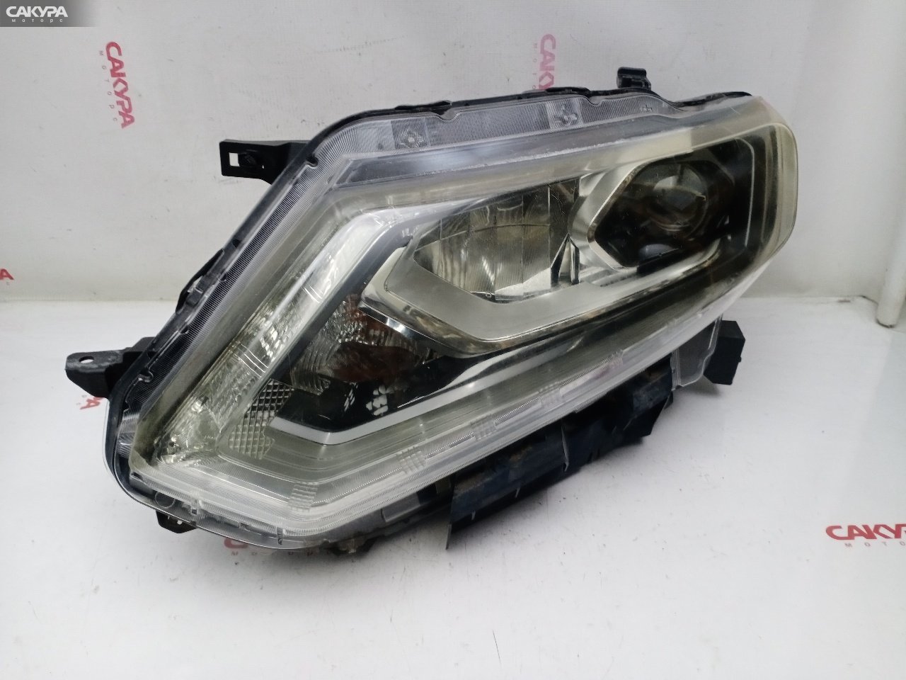 Фара левая Nissan X-TRAIL NT32 MR20DD 100-17942: купить в Сакура Красноярск.