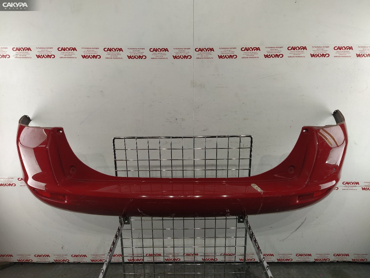 Бампер задний Mazda Demio DY5W ZY-VE: купить в Сакура Красноярск.