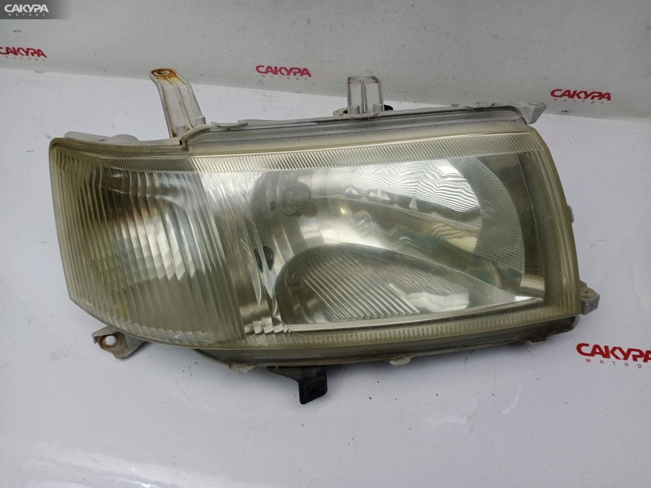Фара правая Toyota Probox NCP50V 2NZ-FE 52-075: купить в Сакура Красноярск.