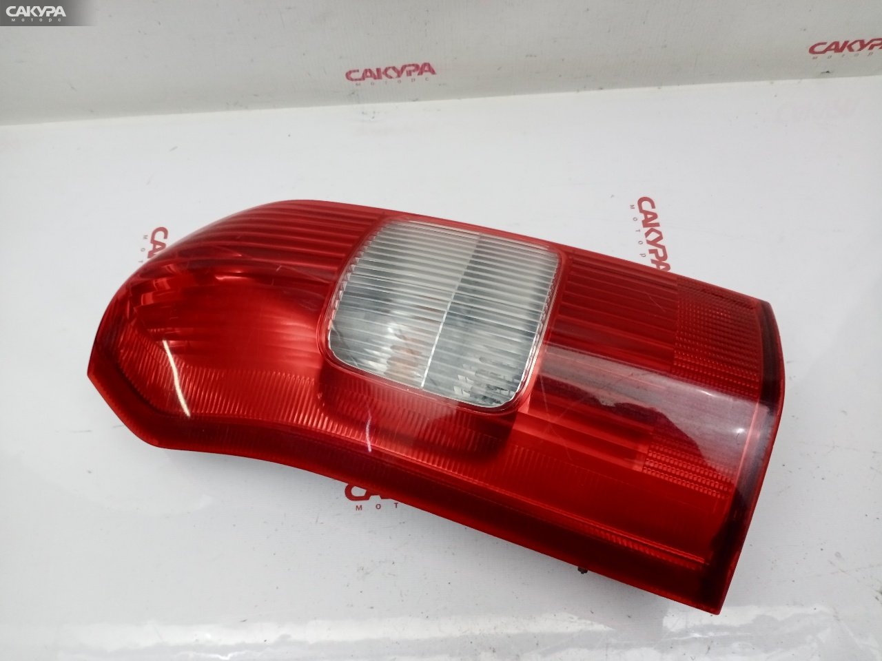 Фонарь стоп-сигнала левый Toyota Probox NCP50V 2NZ-FE 52-078: купить в Сакура Красноярск.