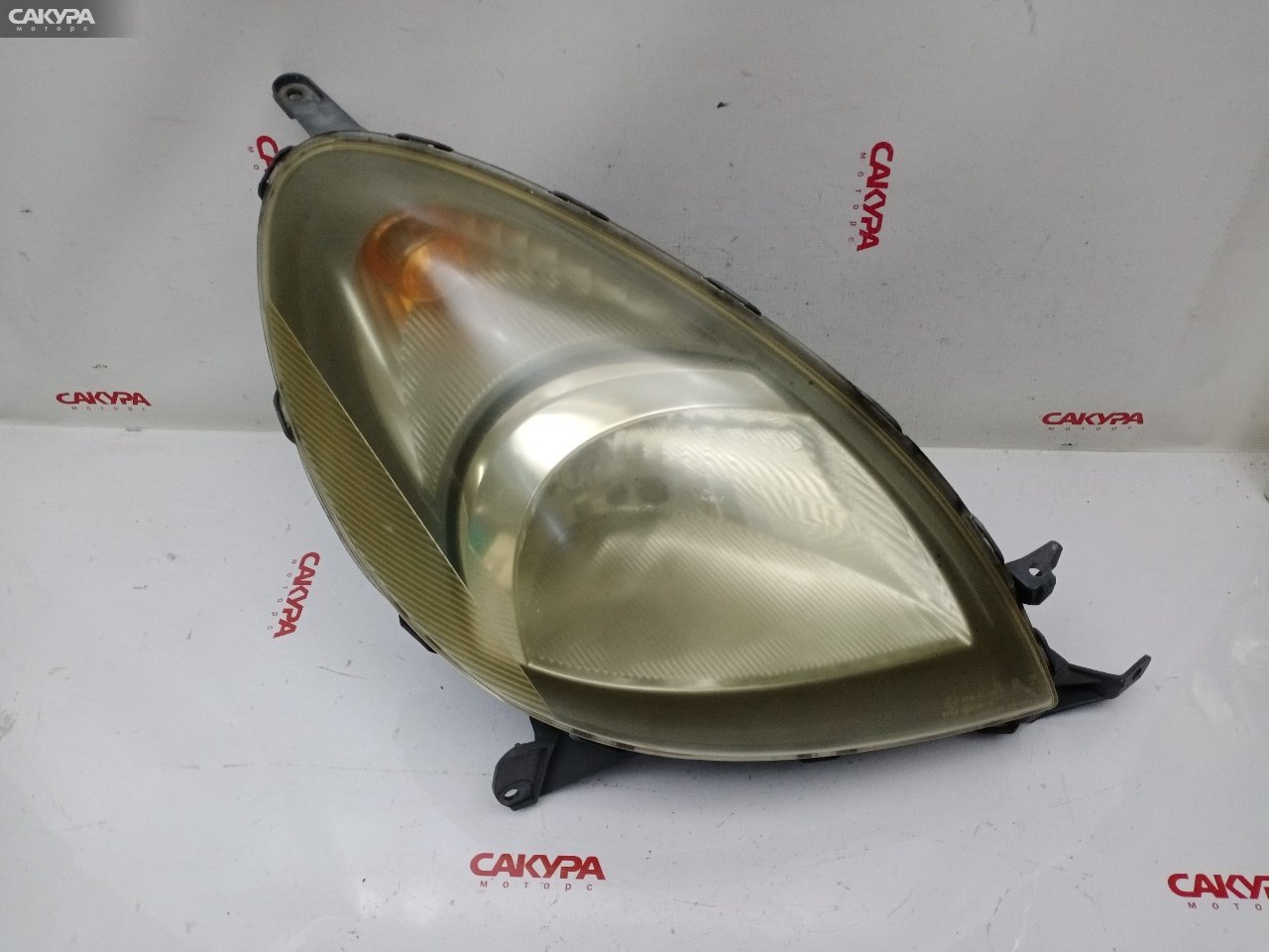 Фара правая Toyota Funcargo NCP21 1NZ-FE 52-024: купить в Сакура Красноярск.