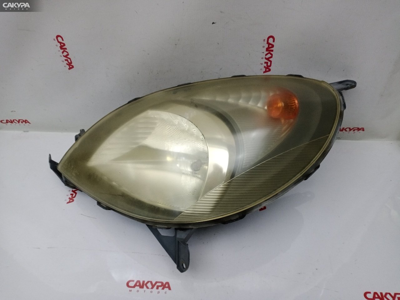 Фара левая Toyota Funcargo NCP21 1NZ-FE 52-024: купить в Сакура Красноярск.