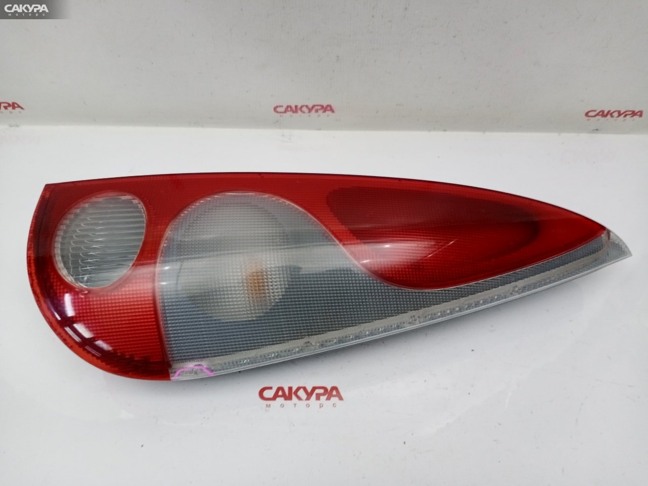 Фонарь стоп-сигнала правый Toyota Funcargo NCP21 1NZ-FE 52-027: купить в Сакура Красноярск.
