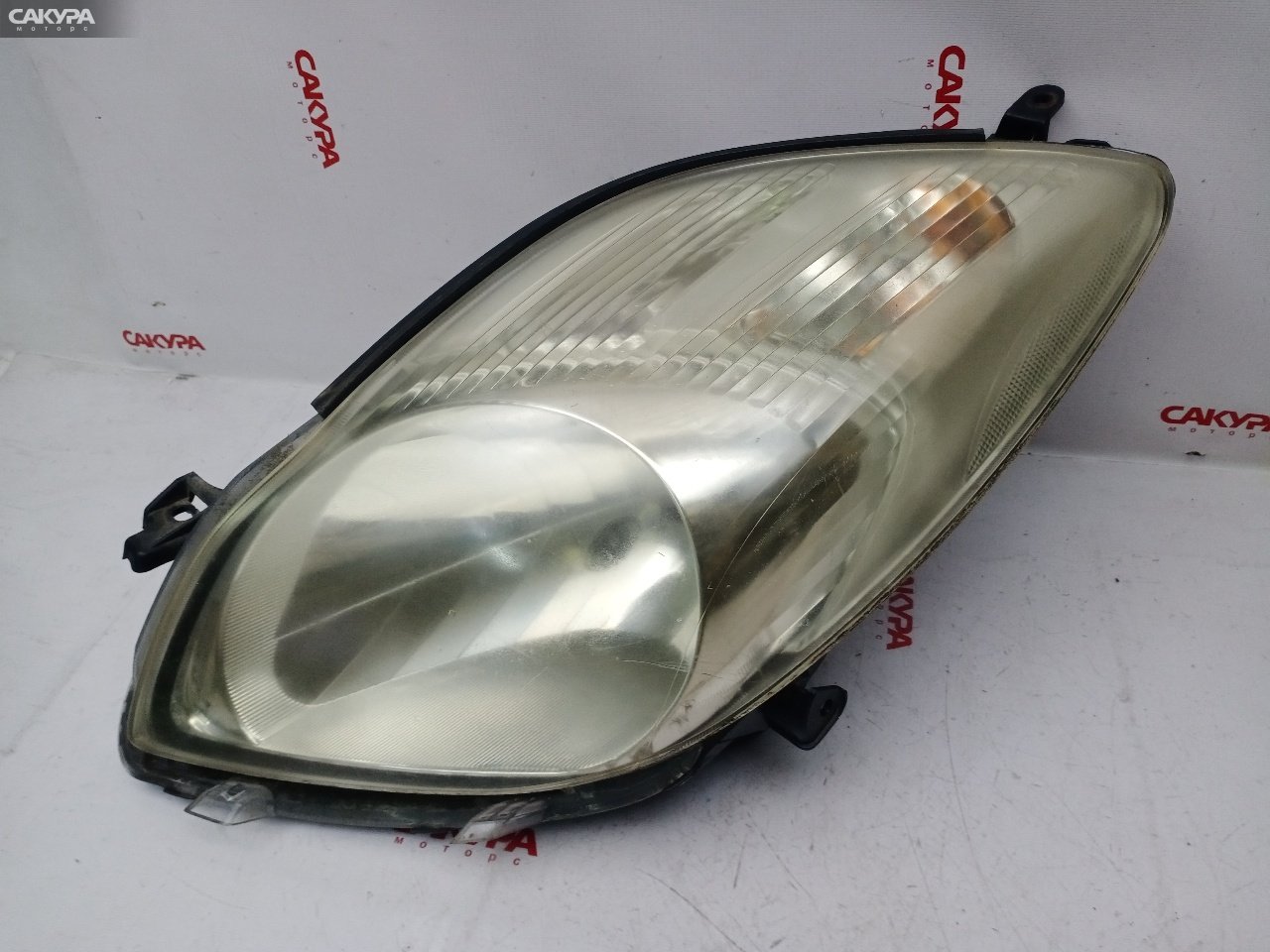 Фара левая Toyota Vitz SCP90 2SZ-FE 52-184: купить в Сакура Красноярск.