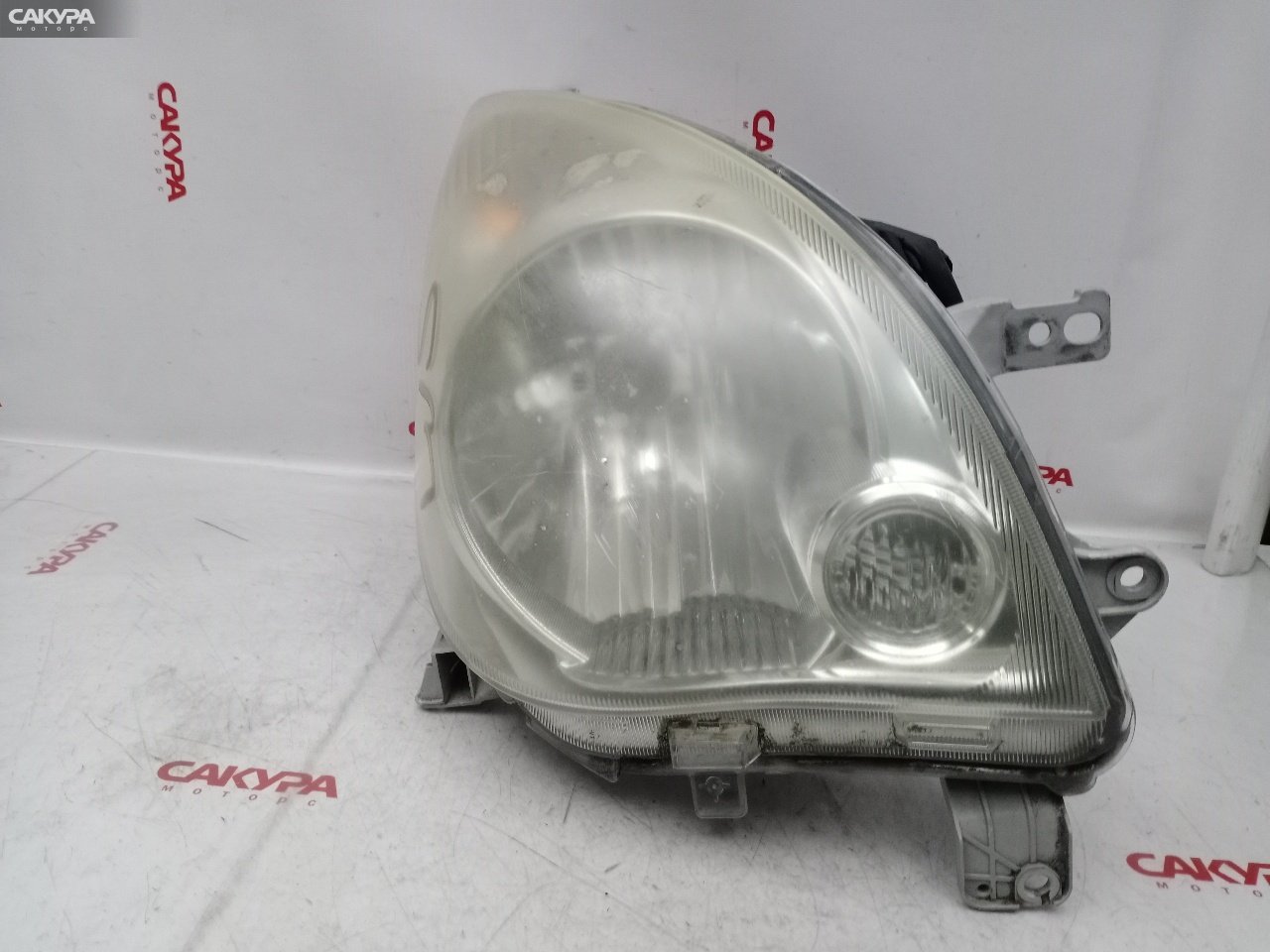 Фара правая Daihatsu Mira L275S KF-VE 100-51870: купить в Сакура Красноярск.