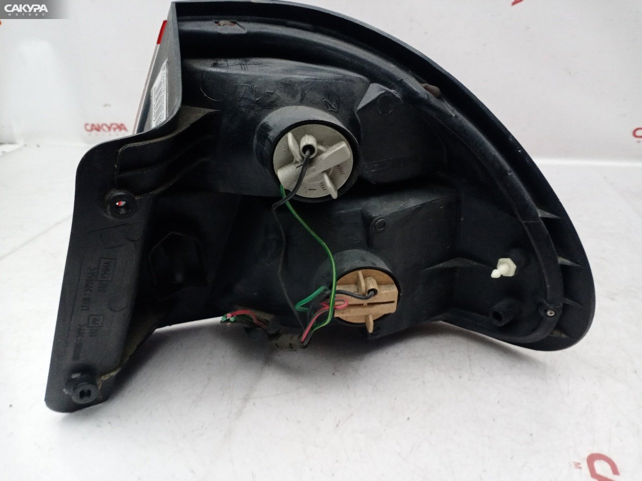 Фонарь стоп-сигнала левый Mazda Familia BHA3P B3-ME 220-61700: купить в Сакура Красноярск.
