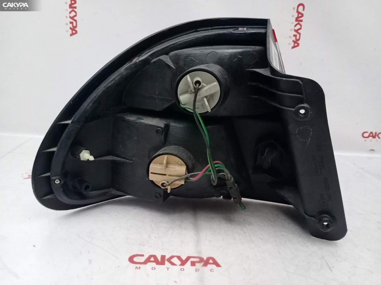 Фонарь стоп-сигнала правый Mazda Familia BHA3P B3-ME 220-61700: купить в Сакура Красноярск.