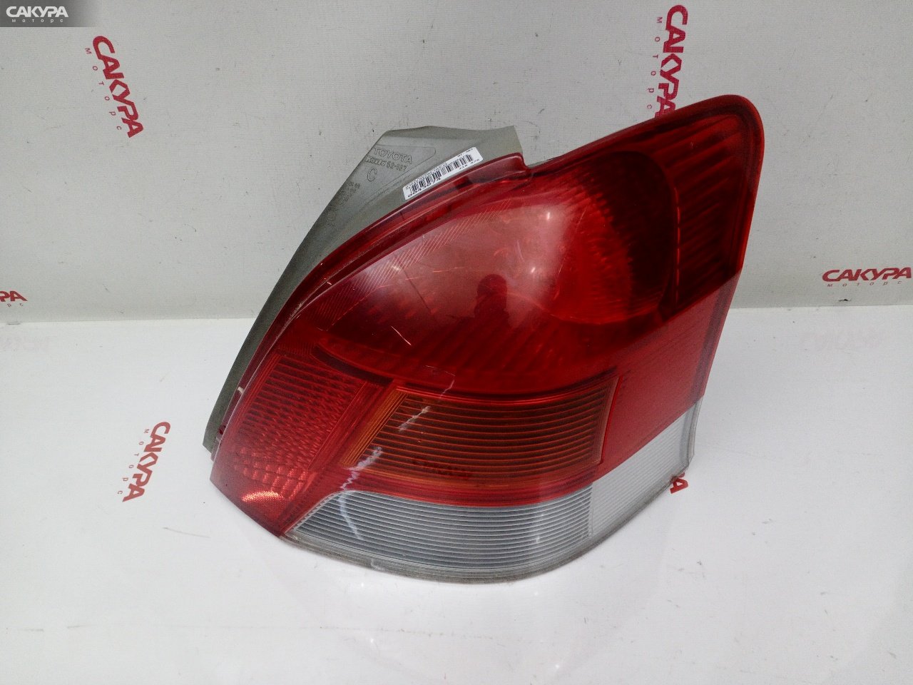 Фонарь стоп-сигнала правый Toyota Vitz KSP90 1KR-FE 52-187: купить в Сакура Красноярск.