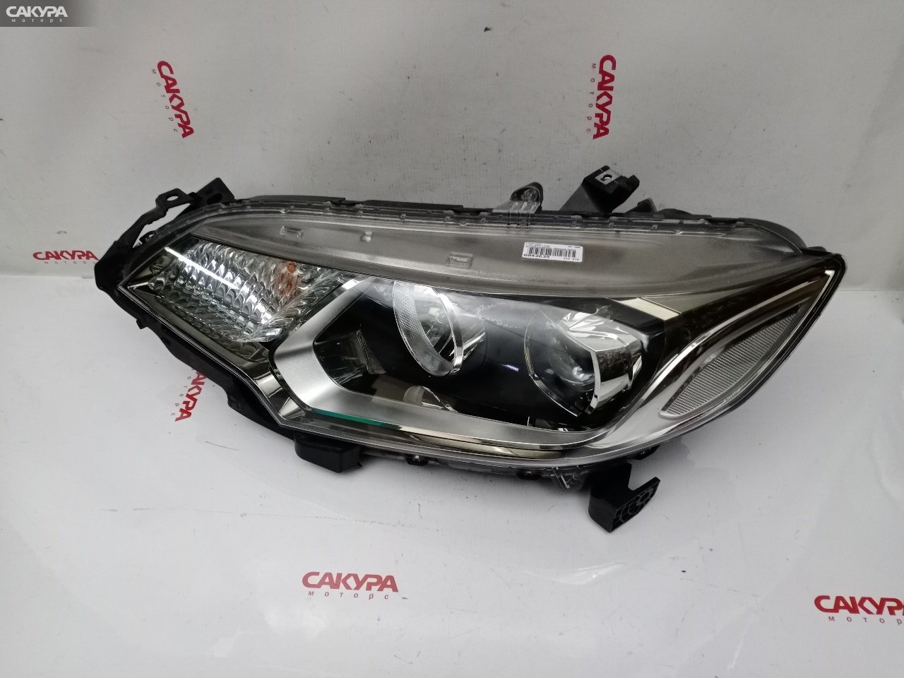 Фара левая Honda FIT GK3 L13B W1948: купить в Сакура Красноярск.