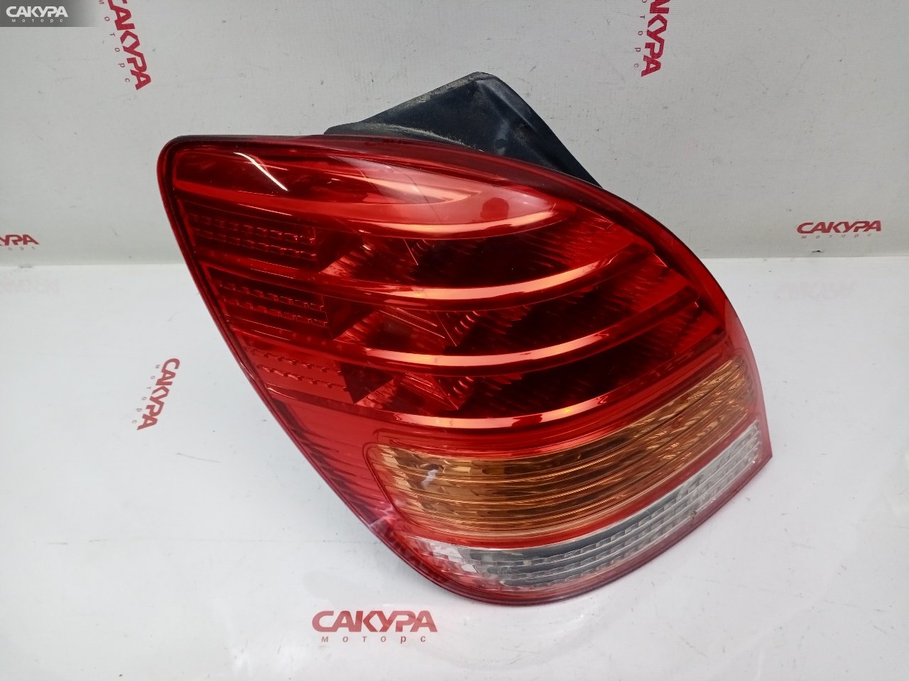 Фонарь стоп-сигнала левый Toyota Corolla Spacio ZZE122N 1ZZ-FE 13-85: купить в Сакура Красноярск.
