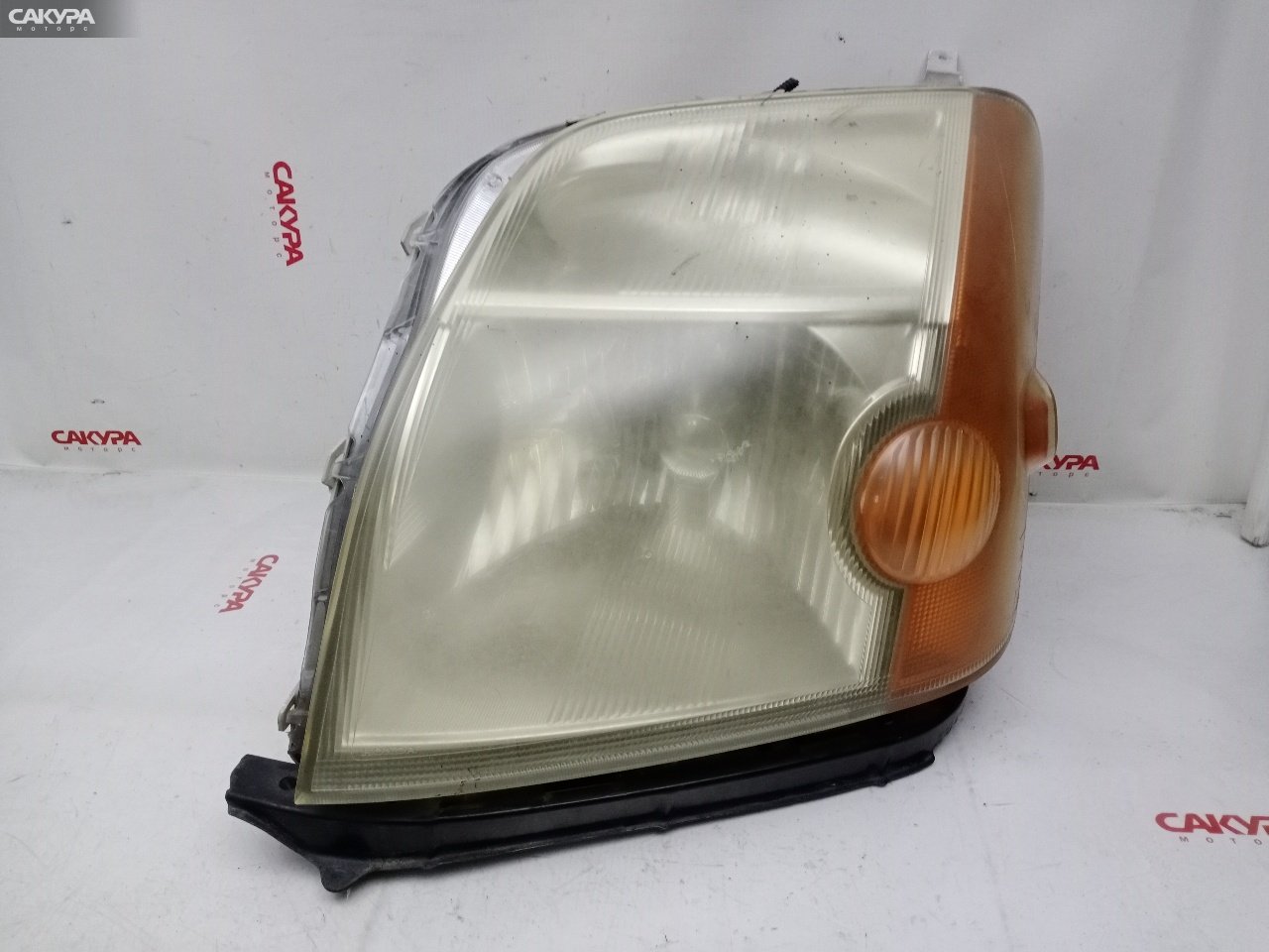Фара левая Honda Mobilio GB1 L15A 100-22434: купить в Сакура Красноярск.
