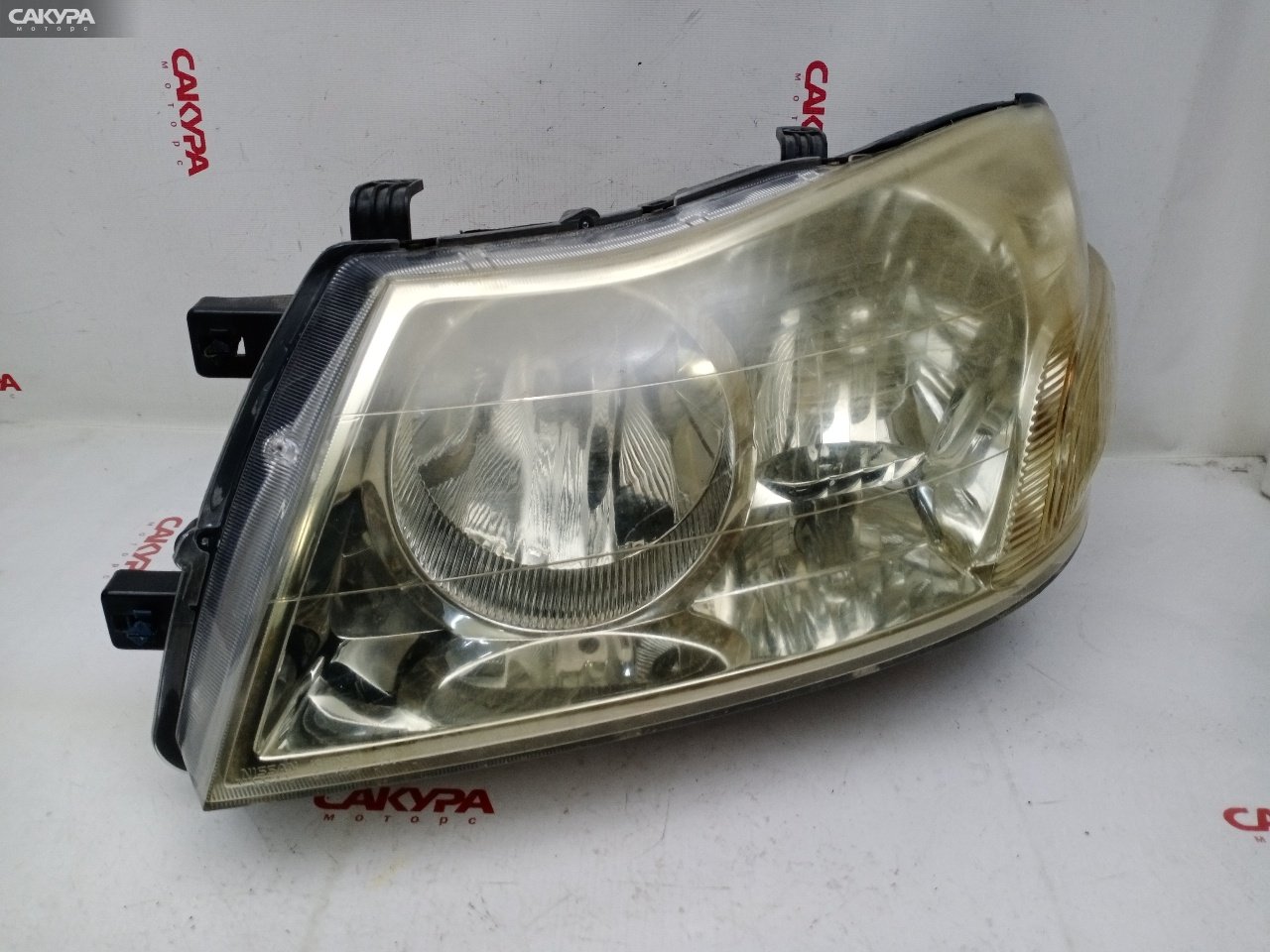 Фара левая Nissan Liberty RM12 QR20DE 1717: купить в Сакура Красноярск.