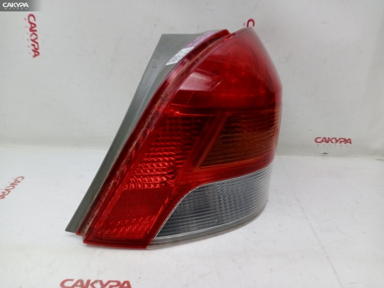 Фонарь стоп-сигнала правый Toyota Vitz KSP90 1KR-FE 52-187: купить в Сакура Красноярск.