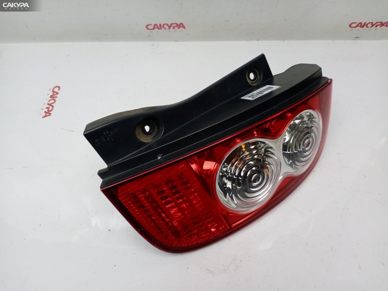 Фонарь стоп-сигнала правый Nissan March AK12 CR12DE D019: купить в Сакура Красноярск.