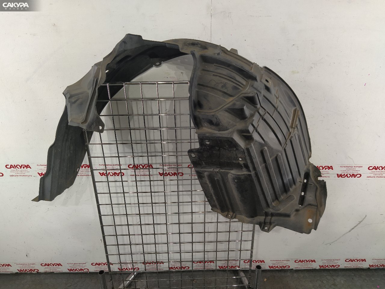 Подкрылок передний левый Nissan March AK12 CR12DE: купить в Сакура Красноярск.