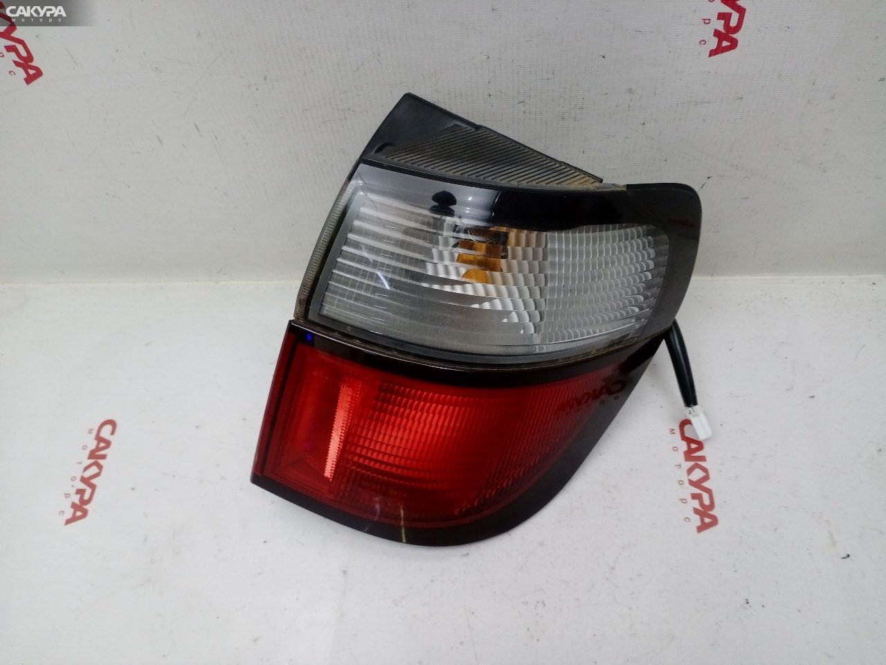 Фонарь стоп-сигнала правый Mazda Capella GWEW FS-DE R2265: купить в Сакура Красноярск.