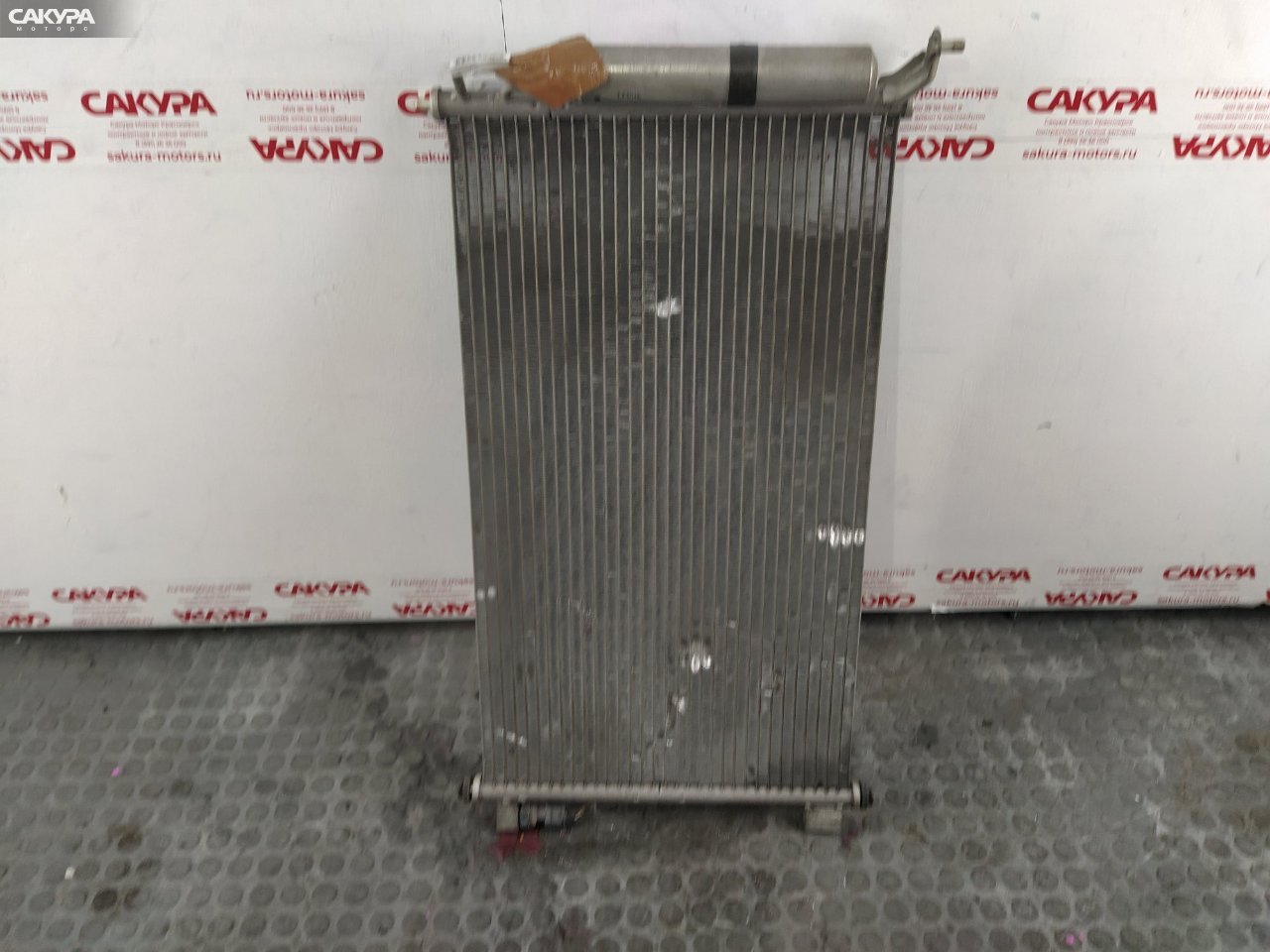Радиатор кондиционера Nissan March AK12 CR12DE: купить в Сакура Красноярск.