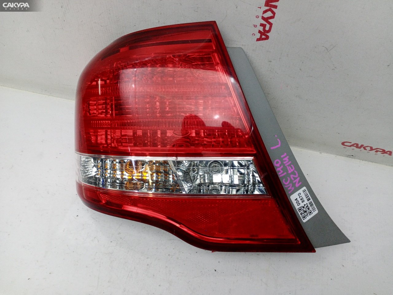 Фонарь стоп-сигнала левый Toyota Corolla Axio NZE141 1NZ-FE 12-545: купить в Сакура Красноярск.