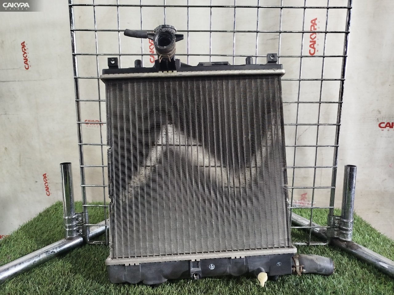 Радиатор двигателя Suzuki Cervo HG21S K6A: купить в Сакура Красноярск.
