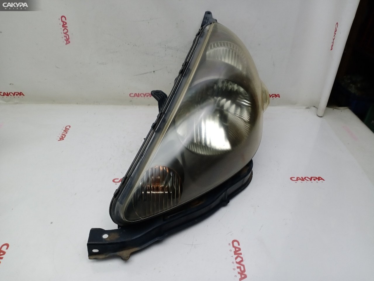 Фара левая Honda FIT GD1 L13A P1680: купить в Сакура Красноярск.