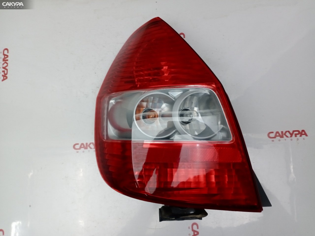 Фонарь стоп-сигнала левый Honda FIT GD1 L13A 4949: купить в Сакура Красноярск.