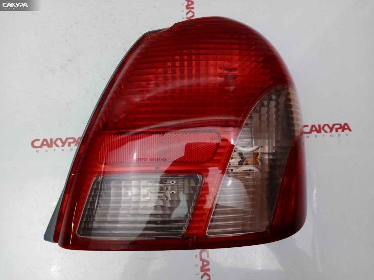 Фонарь стоп-сигнала правый Toyota Platz NCP12 1NZ-FE 52-013: купить в Сакура Красноярск.