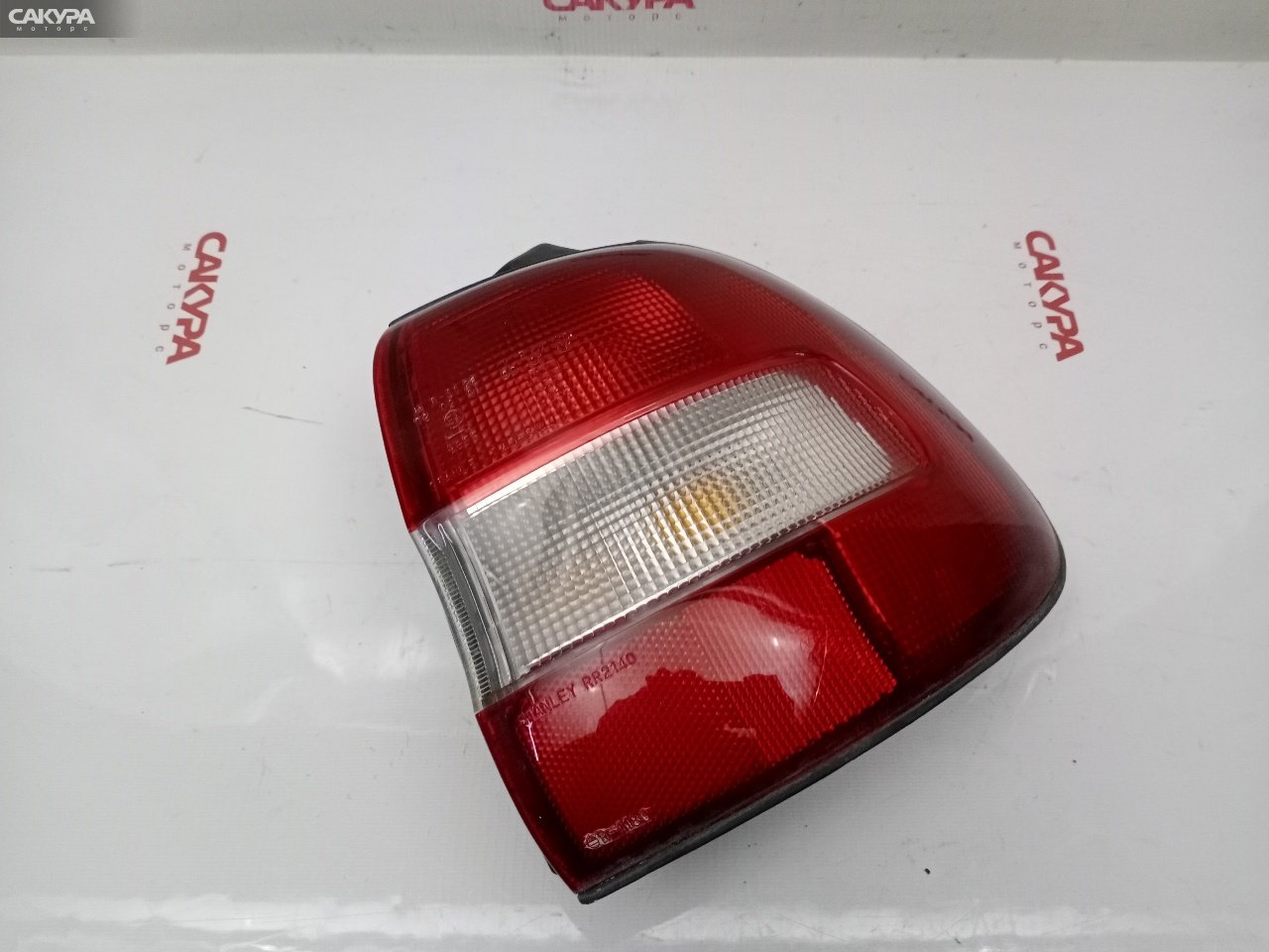 Фонарь стоп-сигнала правый Suzuki Cultus Crescent GC21W G15A 043-2140: купить в Сакура Красноярск.