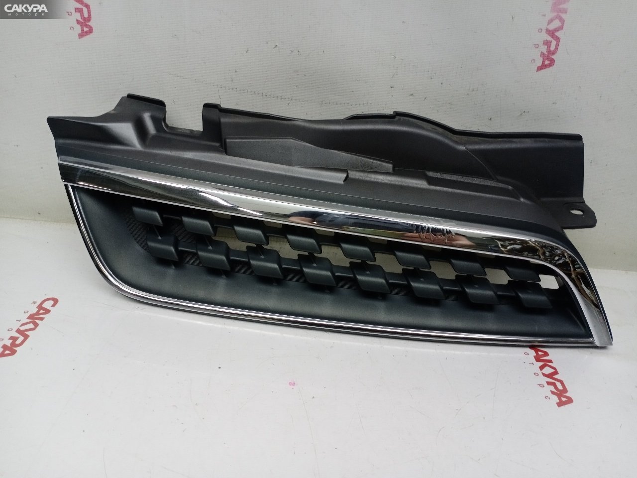 Решетка радиатора правая Nissan March AK12 CR12DE: купить в Сакура Красноярск.