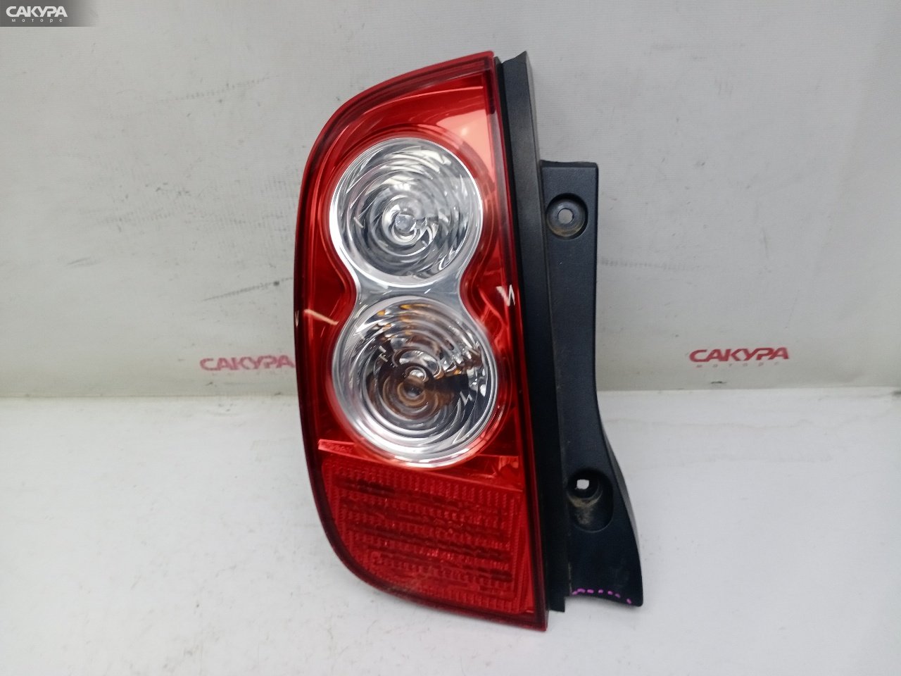 Фонарь стоп-сигнала левый Nissan March AK12 CR12DE D019: купить в Сакура Красноярск.