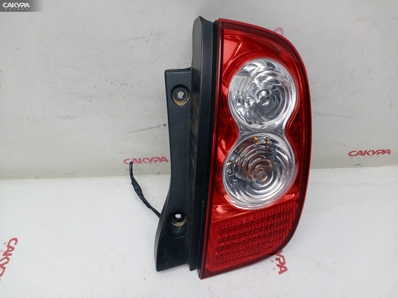 Фонарь стоп-сигнала правый Nissan March AK12 CR12DE D019: купить в Сакура Красноярск.