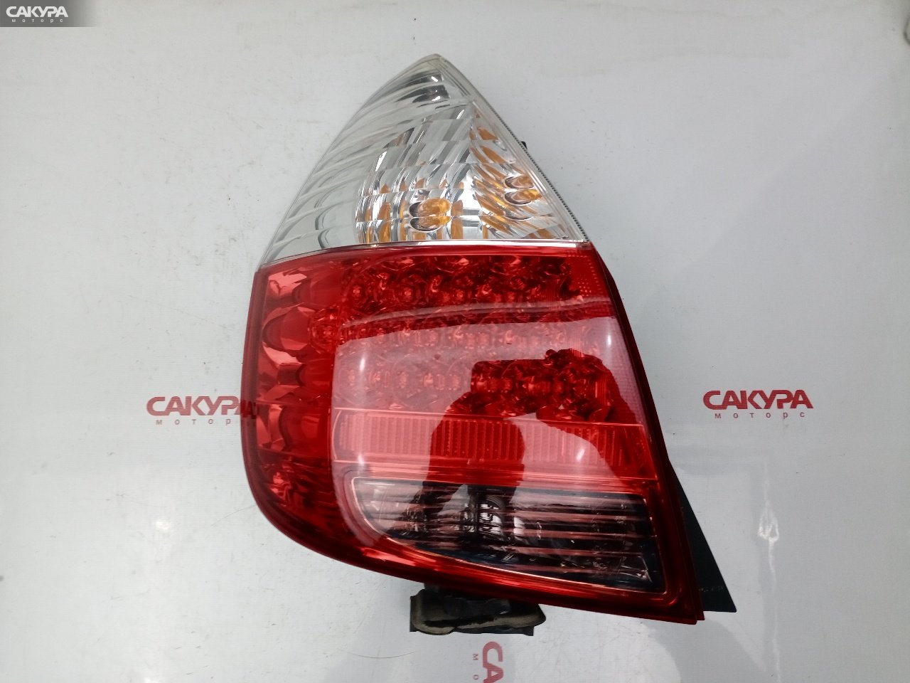 Фонарь стоп-сигнала левый Honda FIT GD1 L13A 4995: купить в Сакура Красноярск.