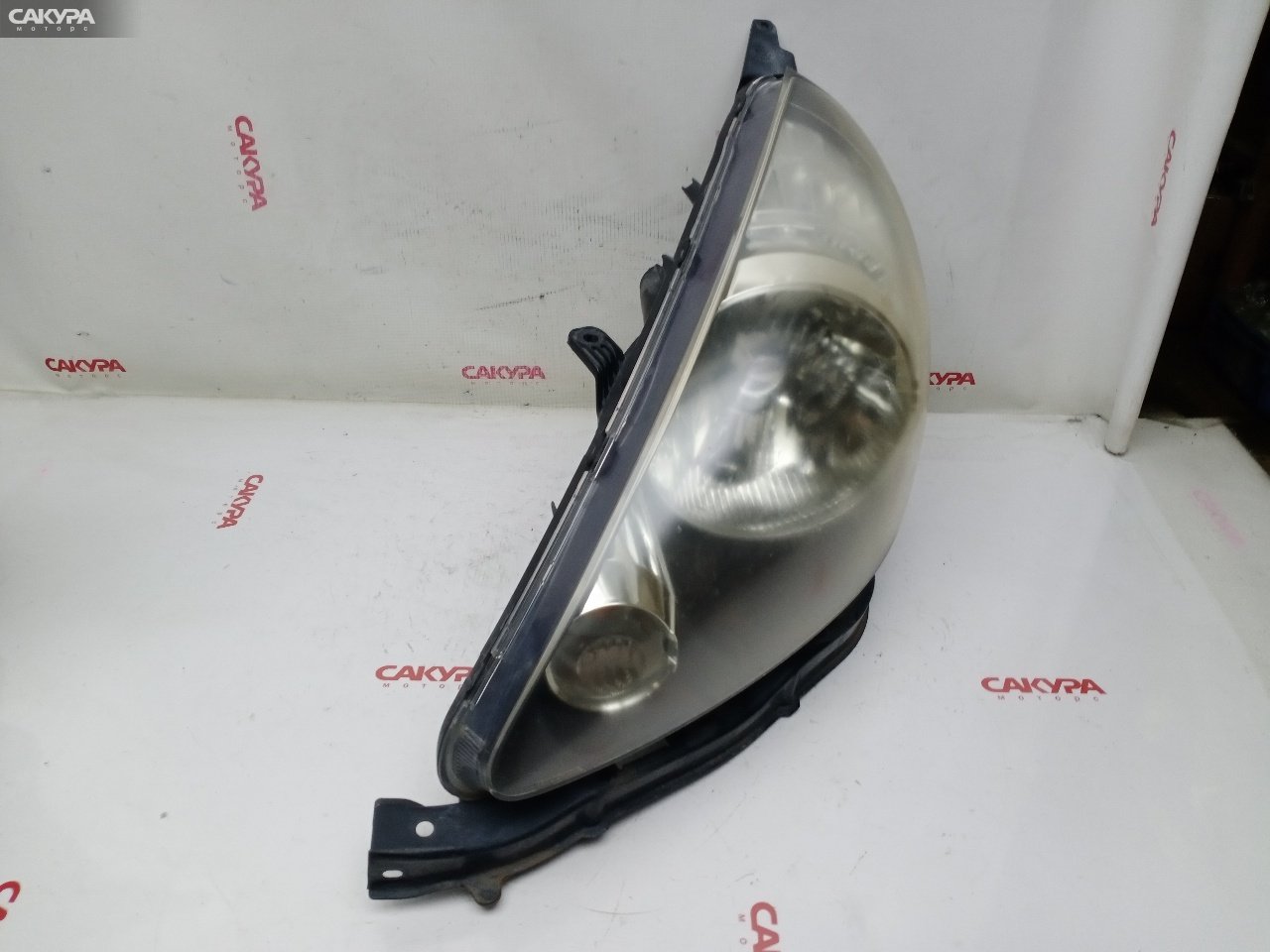 Фара левая Honda FIT GD1 L13A P4945: купить в Сакура Красноярск.