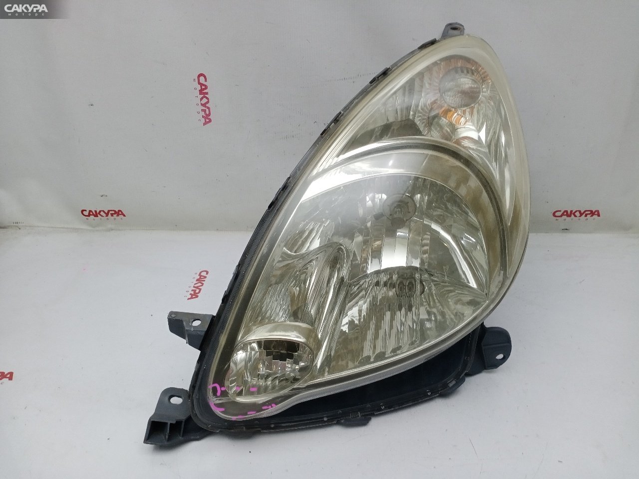Фара левая Toyota Funcargo NCP20 2NZ-FE 52-088: купить в Сакура Красноярск.