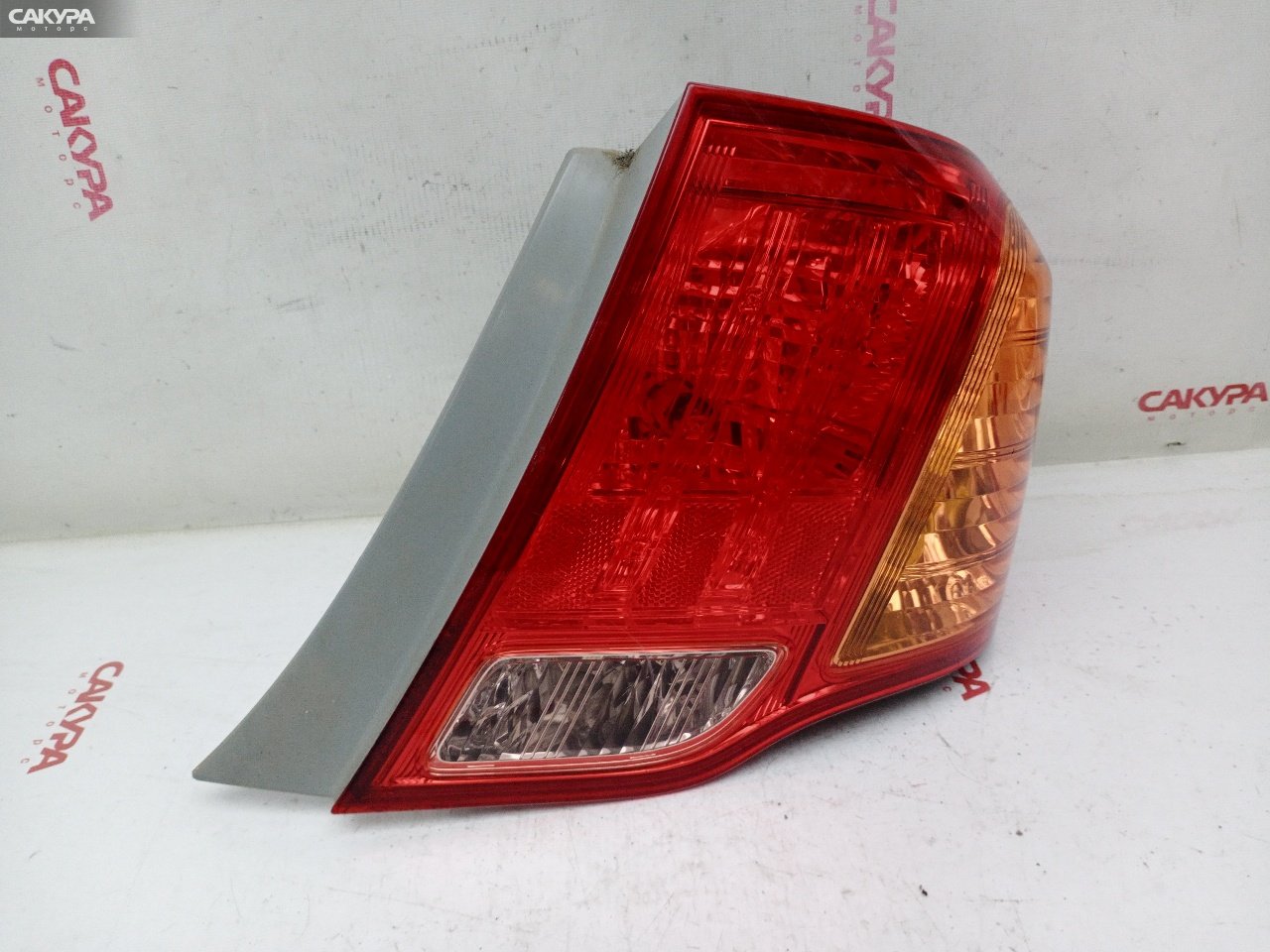 Фонарь стоп-сигнала правый Toyota Corolla Axio ZRE142 2ZR-FE 12-512: купить в Сакура Красноярск.
