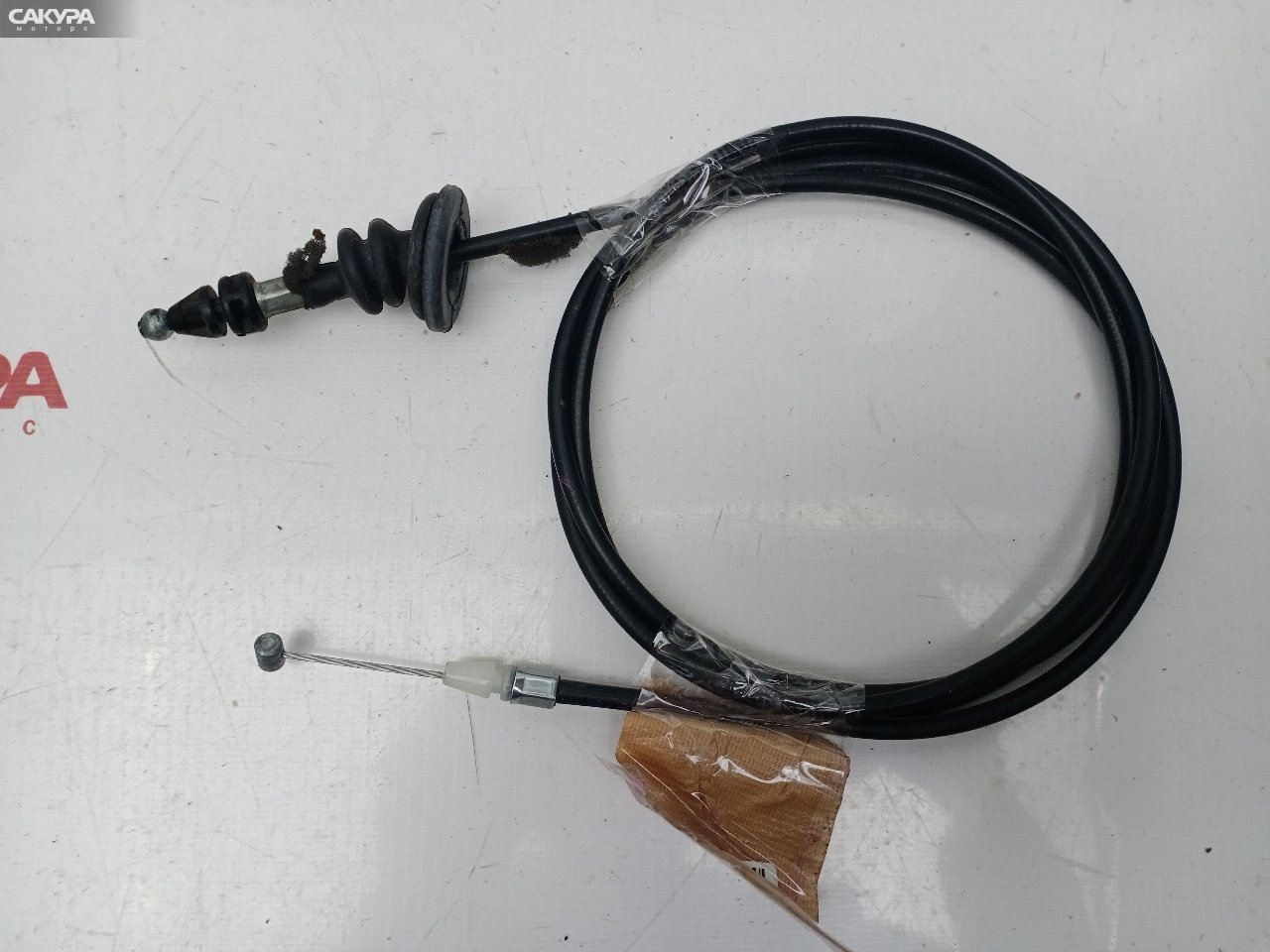 Трос капота Nissan March AK12 CR12DE: купить в Сакура Красноярск.