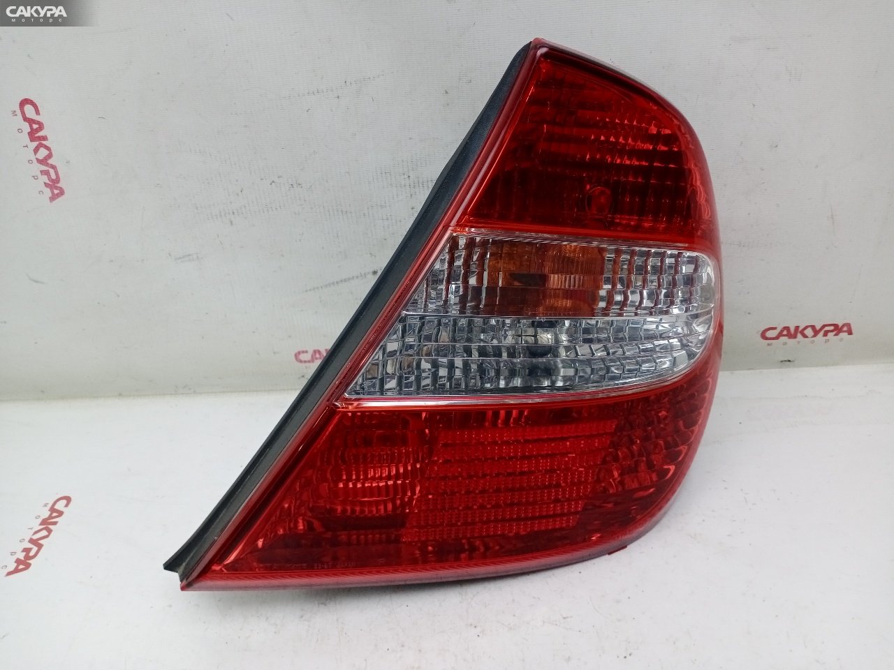 Фонарь стоп-сигнала правый Toyota Camry ACV30 2AZ-FE 33-67: купить в Сакура Красноярск.